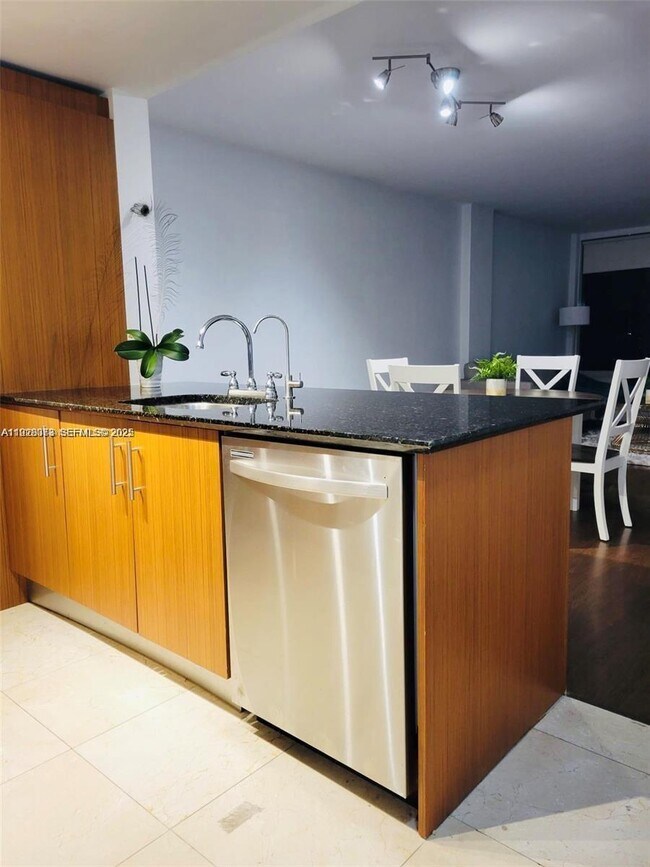 Building Photo - 10275 Collins Ave