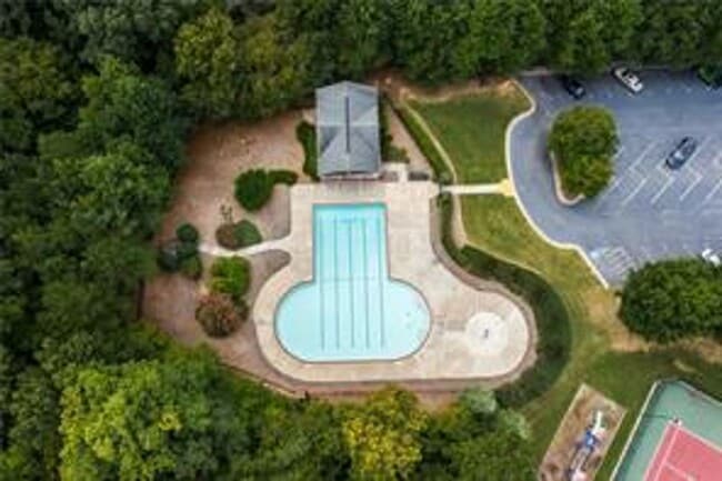 Building Photo - Gorgeous 3-Story Brick Home / 2 Fireplaces / Full Finished Basement / Chapel Hill Schools