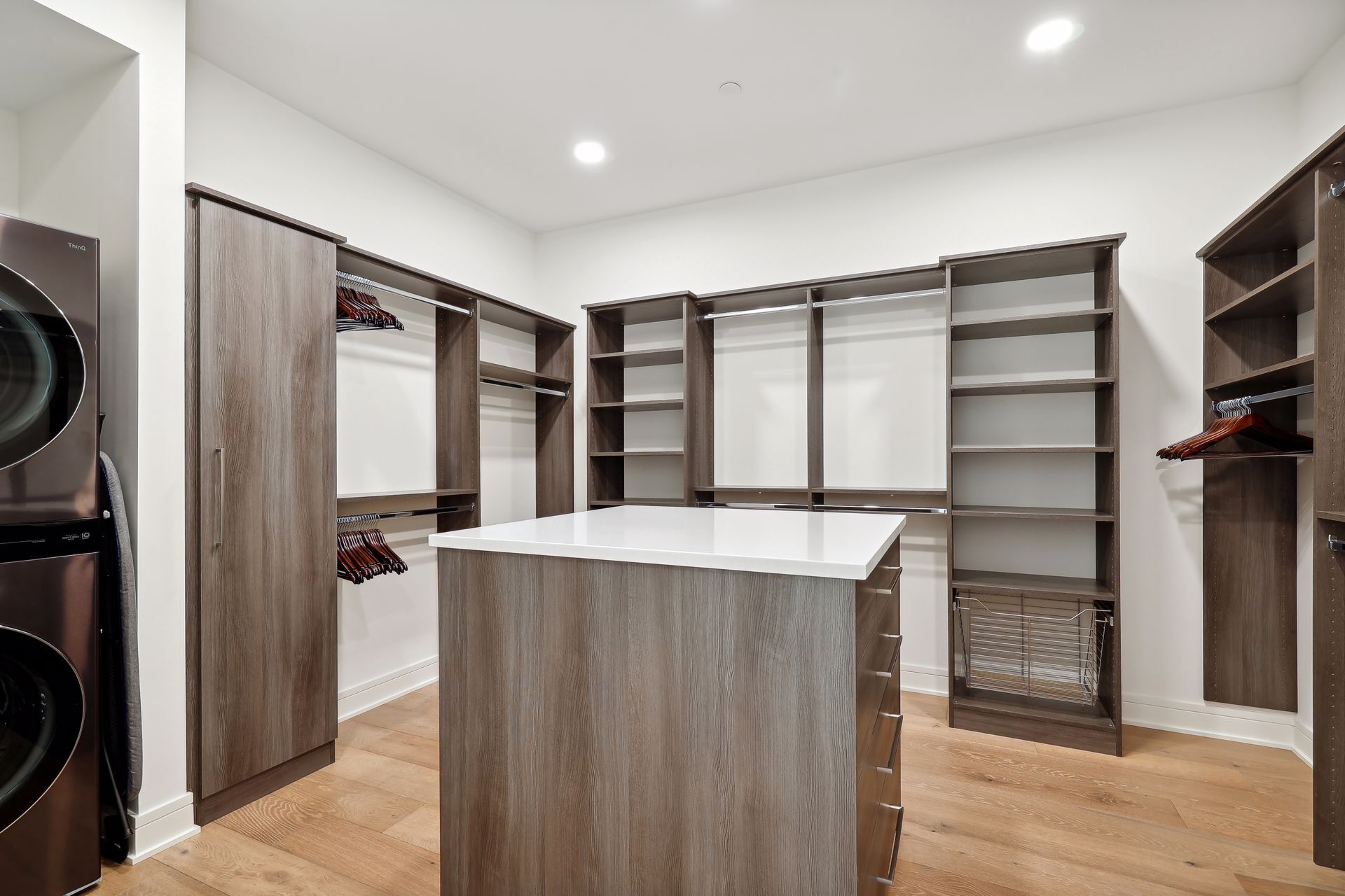 Amazing primary closet space with built-in components and laundry units - 511 2nd St