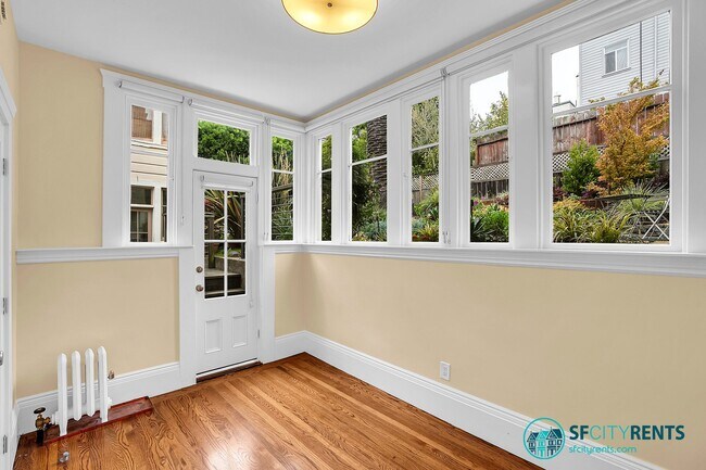 Building Photo - Pacific Heights: Remodeled Bi-Level Condo w/ Private Yard & Garage near Alta Vista Park