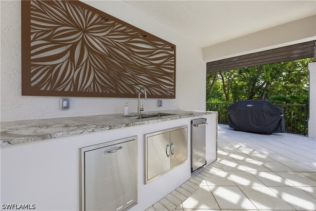 Building Photo - 8990 Bay Colony Dr