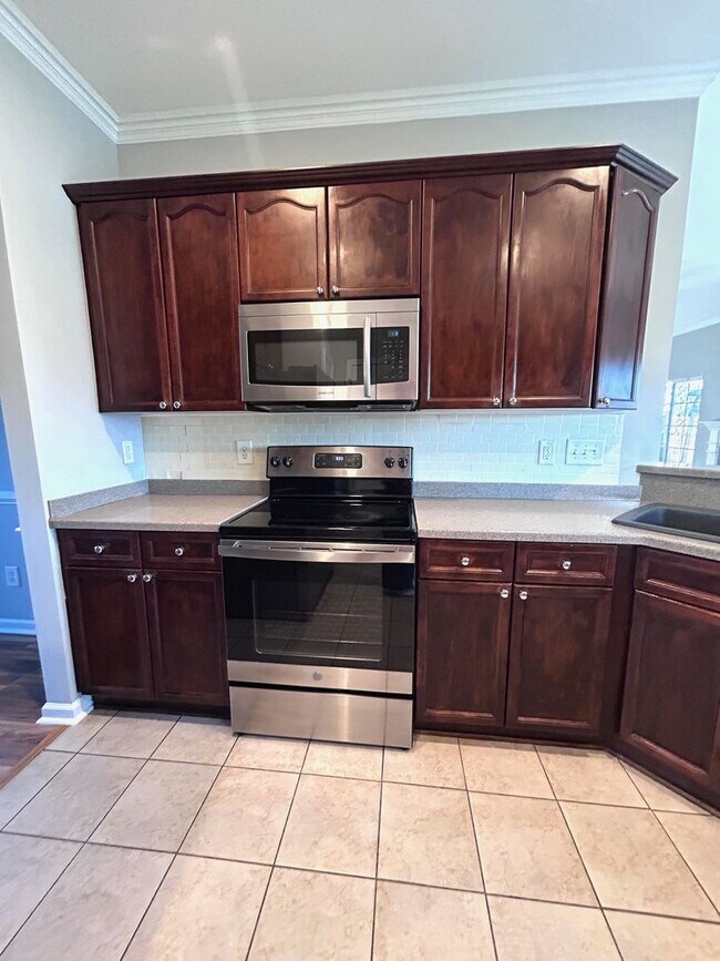 Building Photo - Stunning 4BR Home with amazing pond views!