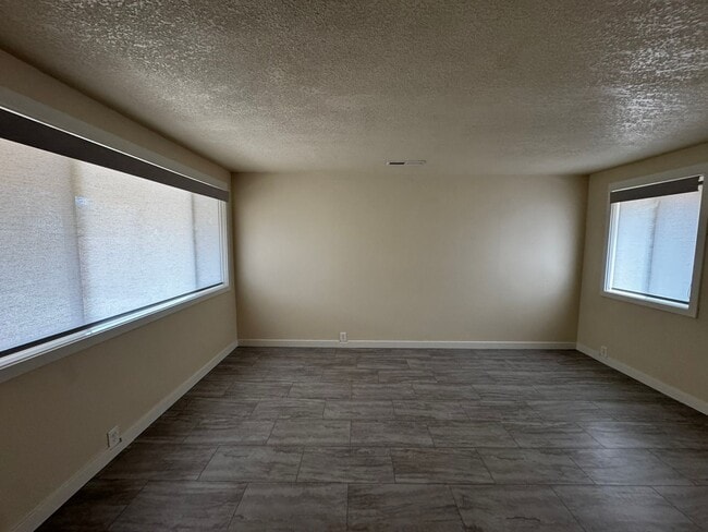 Building Photo - Charming 3 Bedroom Home with Beautiful Backyard & RV Parking