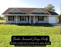 Building Photo - 3 bedroom 2 bath home on large corner lot