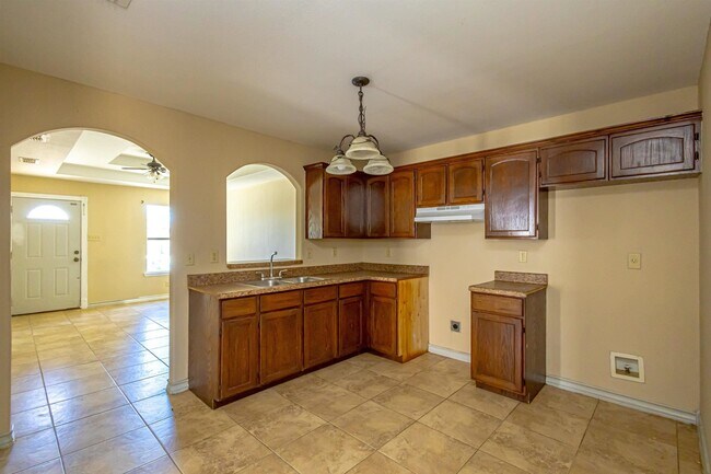 Building Photo - 4416 Wild Flower Ave