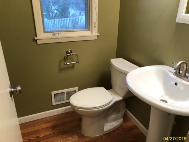 Main floor half bath. - 930 W County Rd D