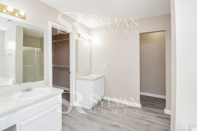 Building Photo - Enjoy living the good life in this 4 bedro...