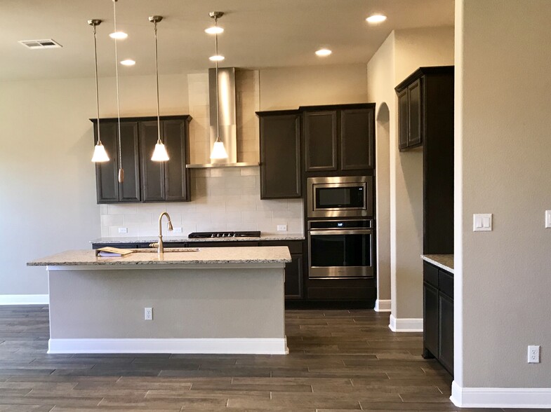 Modern kitchen with fabulous finishes - 3750 E Palm Valley Blvd