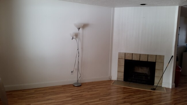 living room w fireplace - 1683 East Fort Union Blvd