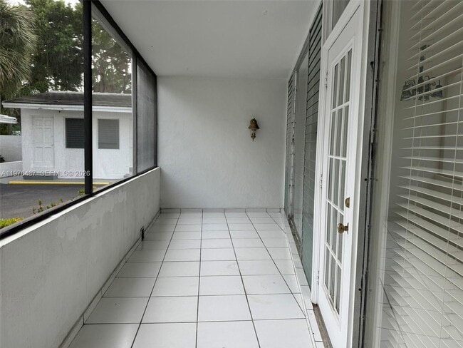 Building Photo - 10210 Collins Ave