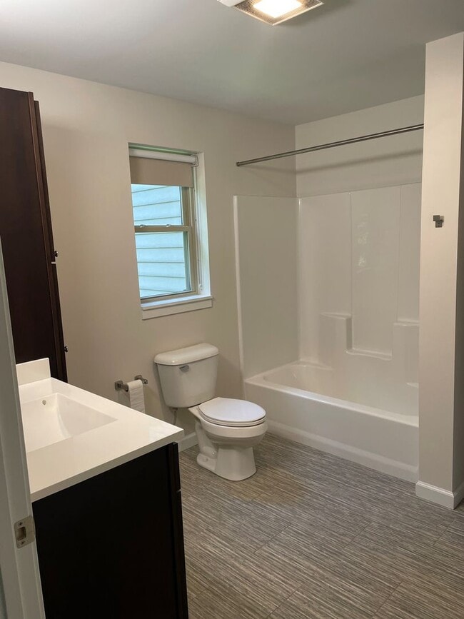 Building Photo - One Bedroom End Unit