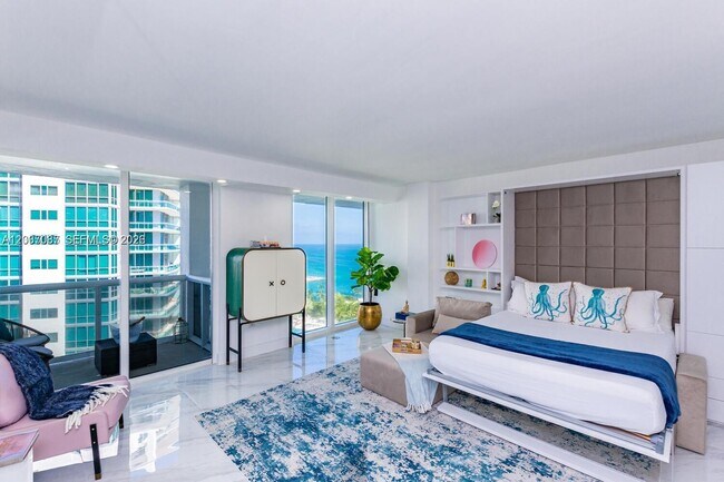 Building Photo - 10275 Collins Ave