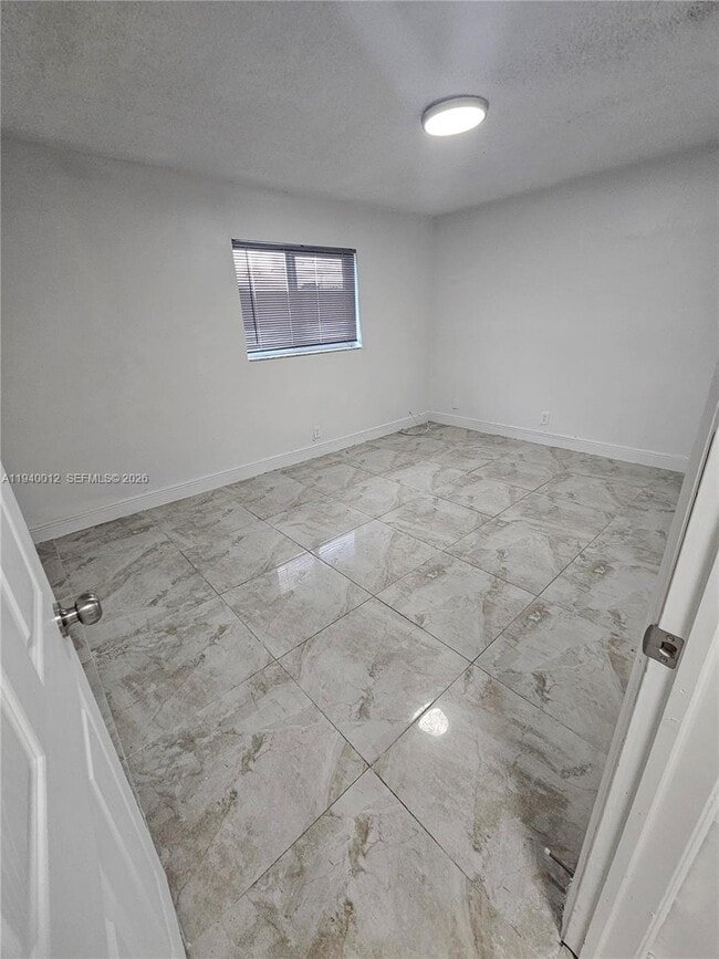 Building Photo - 5615 NW 27th Ct