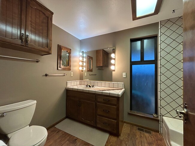 Building Photo - 6367 Woodman Dr