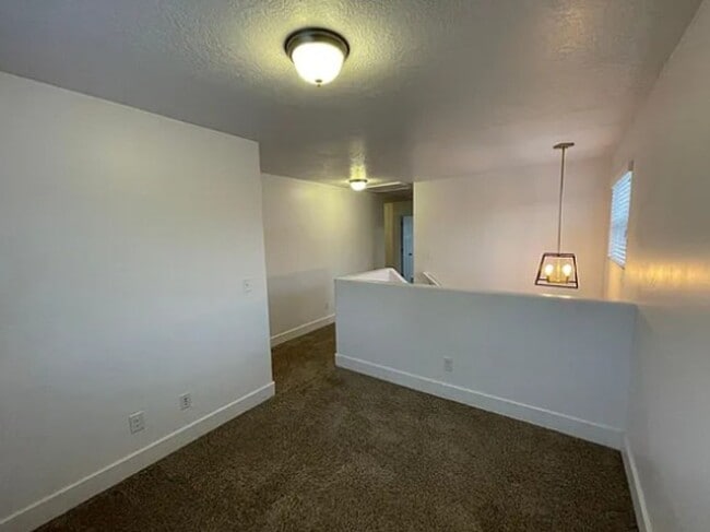 Building Photo - Spacious 4-Bedroom Home with Finished Basement in Taylorsville
