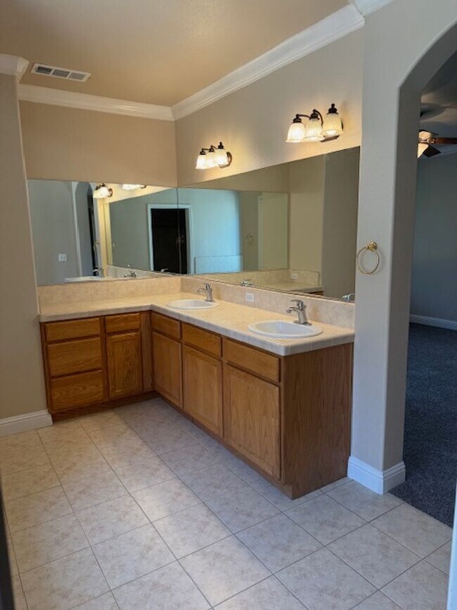 Building Photo - Enterprise Neighborhood 3 Bedroom Home with bonus room and 3 car garage- Landscaping Included!