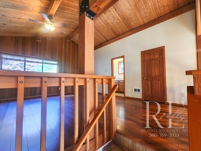 Building Photo - Waterfront Living in Indianola – Dock, Bea...