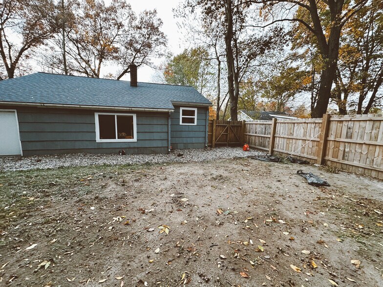 Fenced in backyard with utility shed - 9275 1st St