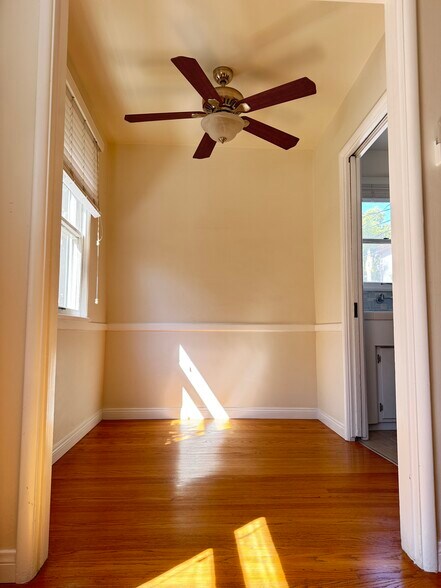 Bright dining room with ceiling fan - 554 E Cypress Ave