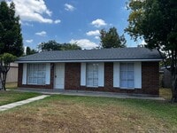 Building Photo - 3 Bedroom, 1.5 Bathroom, Brick Home with yard and Storage Building, Covered Porch