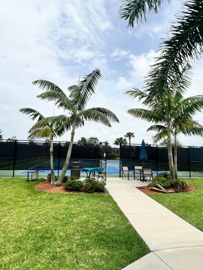 Building Photo - STUNNING LAKEFRONT 3 BEDROOM, 2.5 BATH HOM...