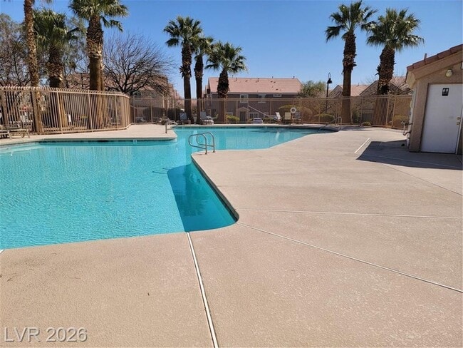Building Photo - FANTASTIC SOUTHWEST TOWNHOME IN A GATED COMMUNITY!