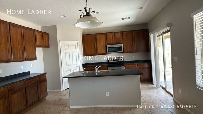 Building Photo - 4703 S 99th Dr