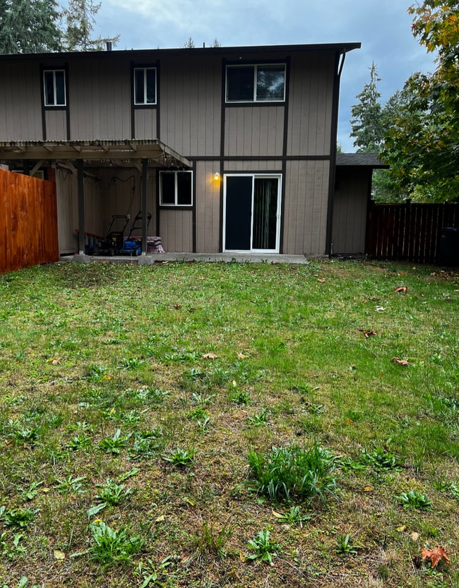 Building Photo - 2 Story Duplex Available. HUGE, FENCED YAR...
