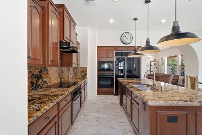 Building Photo - Private Gated Christopher Homes Estate in The Vineyards | Resort-Style Backyard & Strip Views
