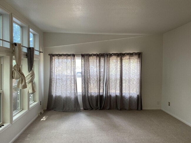 Building Photo - Available Now! "Spacious 3-Bedroom Retreat...