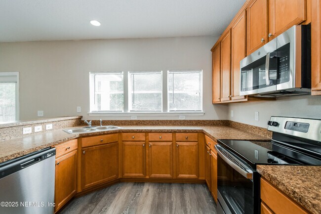 Building Photo - 9370 Jayhawk Ln
