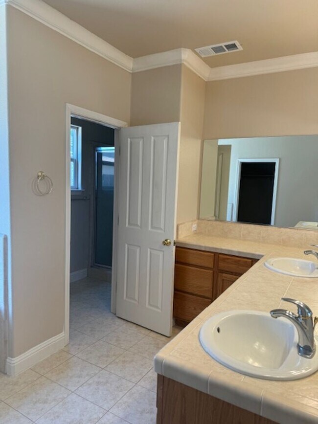 Building Photo - Enterprise Neighborhood 3 Bedroom Home with bonus room and 3 car garage- Landscaping Included!