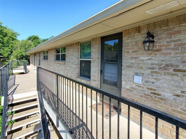 Back door of the unit. - 7718 Royal Ln