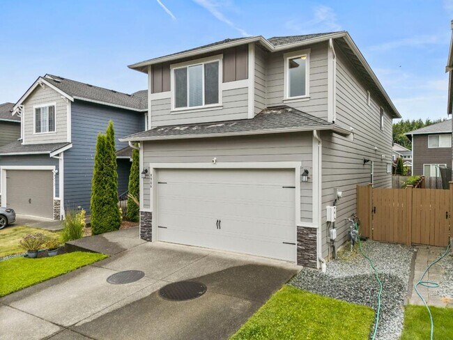 Building Photo - Spacious 4-Bedroom Home with Quartz Counters, Fully Fenced Yard & 2-Car Garage in Yelm!