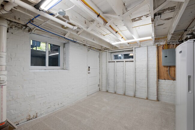 Basement door, opens to the backyard. - 31 Dartford Ave