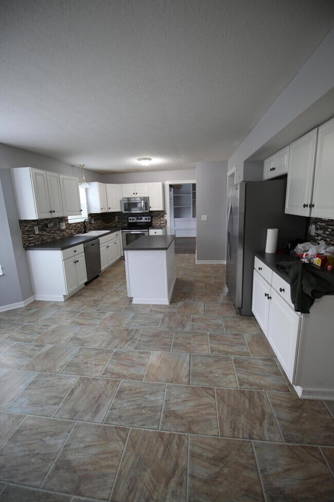 Building Photo - 4400 Greensbury Dr