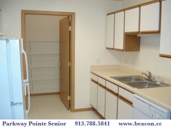 Building Photo - 7601 Parallel Pkwy