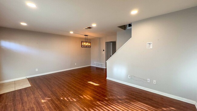Building Photo - Enjoy Half Off Your First Month's Rent! 3-bedroom, 2.5-bath Split-Level Condo