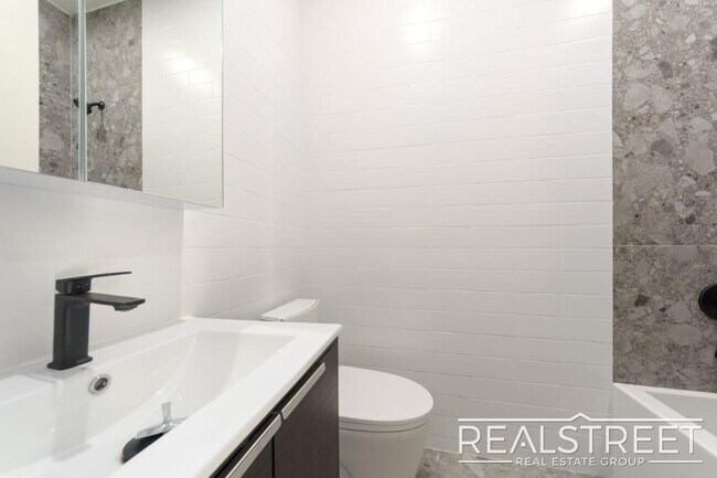 Building Photo - Modern Two-Bedroom Duplex in Prime Clinton Hill – One Block from Pratt University