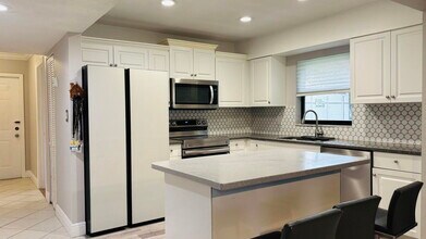 Building Photo - 9521 Boca Cove Cir