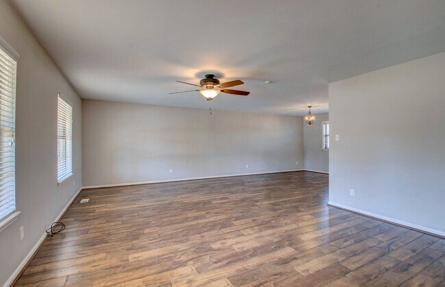 Building Photo - Welcome Home: Charming Brick Beauty with Covered Porch.