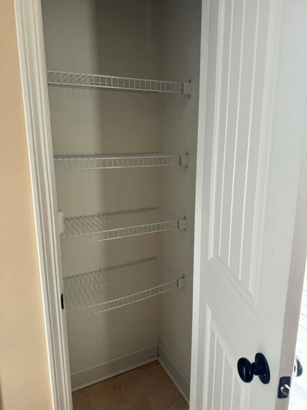 Downstairs half bath linen closet - 232 High Meadows Cir