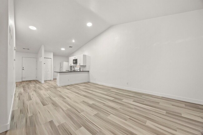 Building Photo - Charming and spacious single-story townhome nestled within a gated community in the desirable Nor...