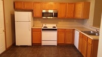 Building Photo - Spacious 2BD 2 BA duplex with 2 Car attached garage. Just a few steps away from everything you need!