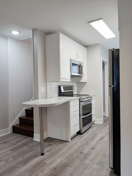 Stairs leading to Bonus Room - 207 14th Ave. NE