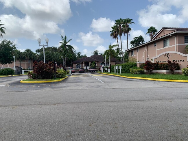 Building Photo - 3221 Sabal Palm Manor