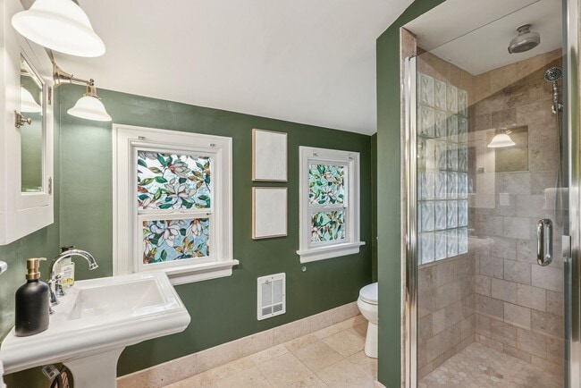 Building Photo - Classic Portland Charm + Modern Comfort in...