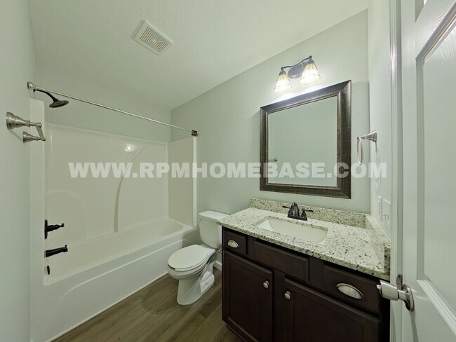 Building Photo - Your Baker Sanctuary with Spacious Backyar...