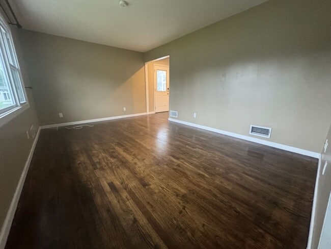 Building Photo - Sunny, Modern Mid-Century Cape 4 BR Spacio...