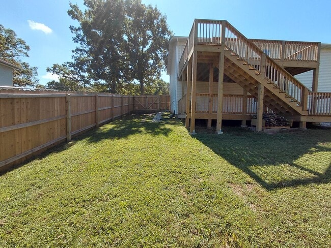 Building Photo - Fenced home close to post